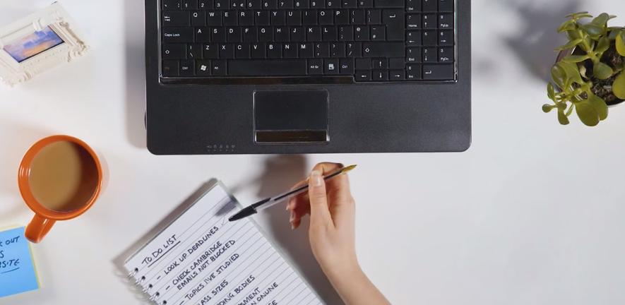 preparing to apply with laptop and notepad