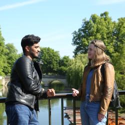 Mature students at Cambridge Students on a bridge