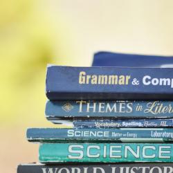 Book stack featuring a range of titles