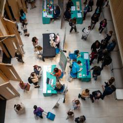 Teachers and Advisers' Webinar Series Overhead view of teachers at a conference