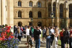 A group of CLASS students and teachers in New Court 