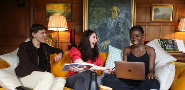 A diverse group of mature students having fun studying together at Wolfson College, Cambridge.