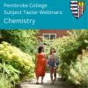 Two students walking through Pembroke College
